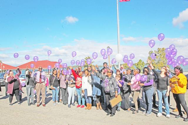 Balloon release honors victims of domestic violence