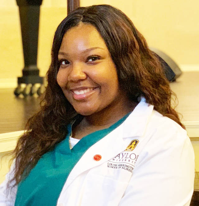 Area resident receives white coat at Baylor University