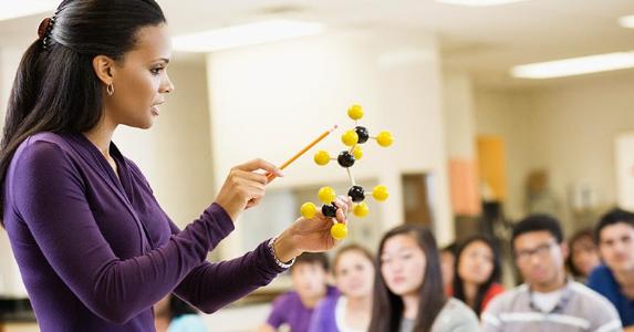 Gov. signs bill raising minimum teacher pay