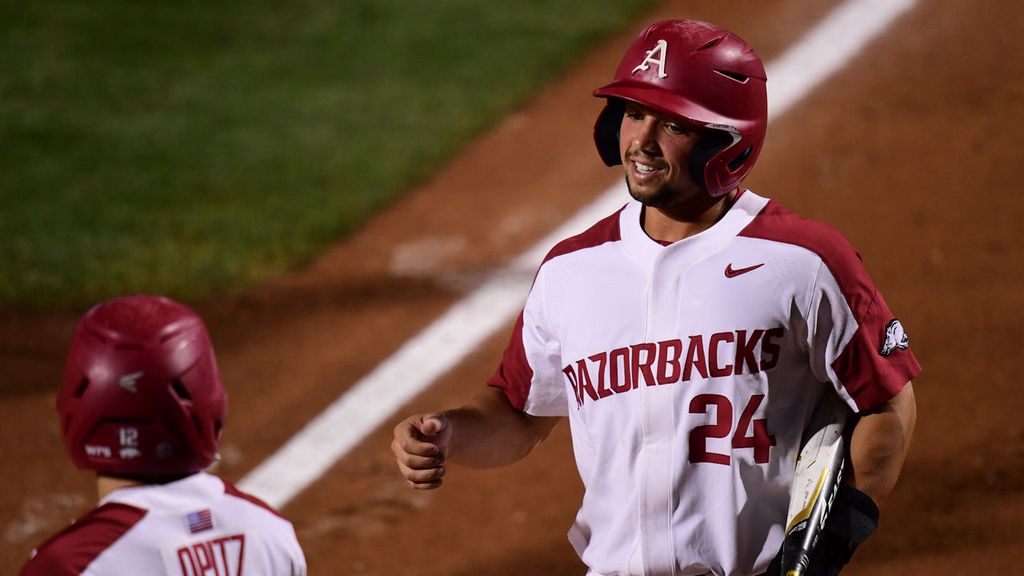Arkansas pounds Ole Miss 14-1, earns return to CWS