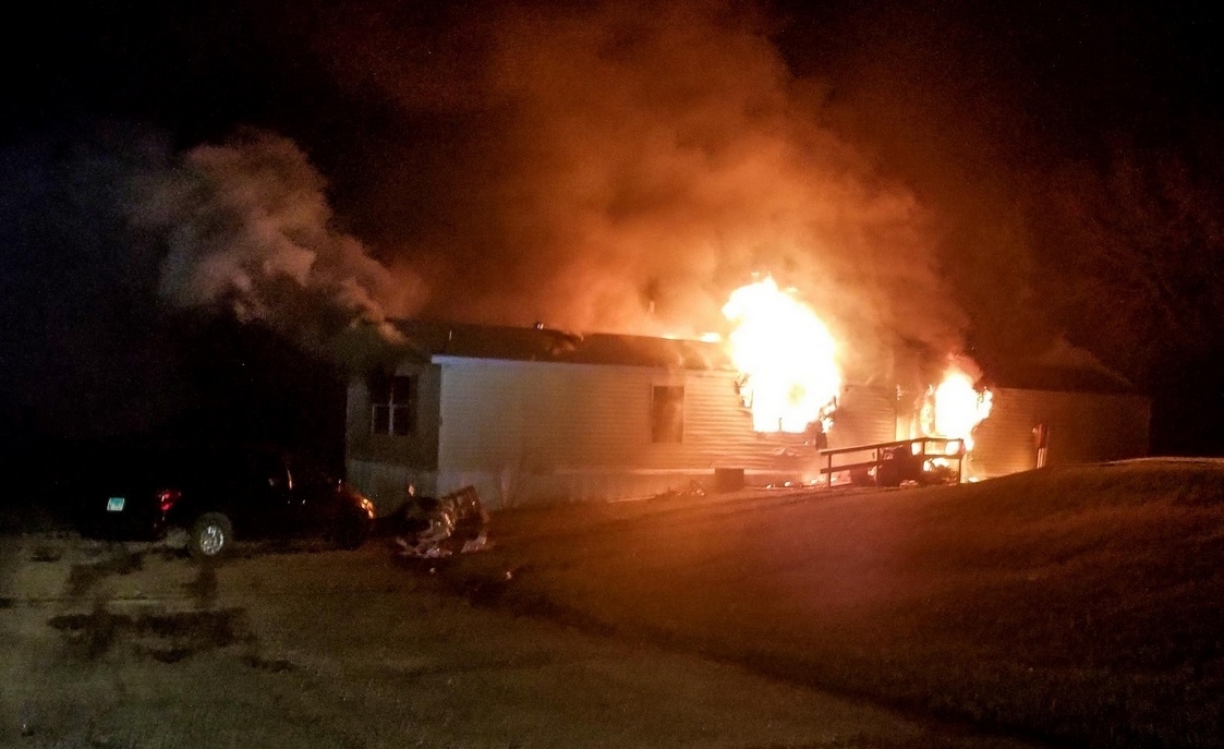 Child, 9, charged with murder after Illinois mobile-home fire kills 5