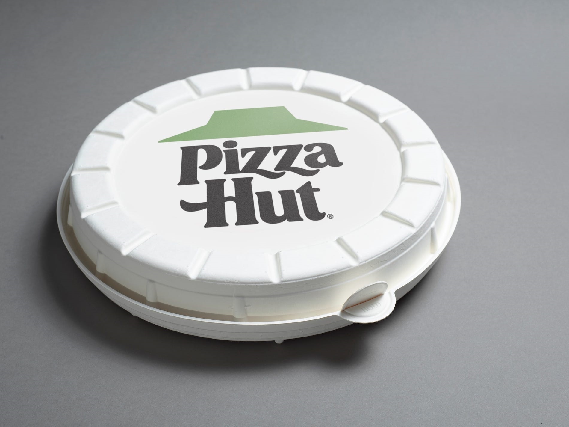 No more square pizza boxes? Pizza Hut testing one that’s round