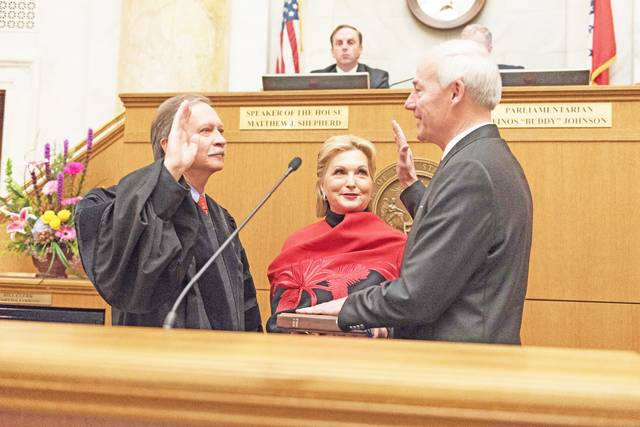 Hutchinson sworn in for 2nd term, promises ‘growth agenda’