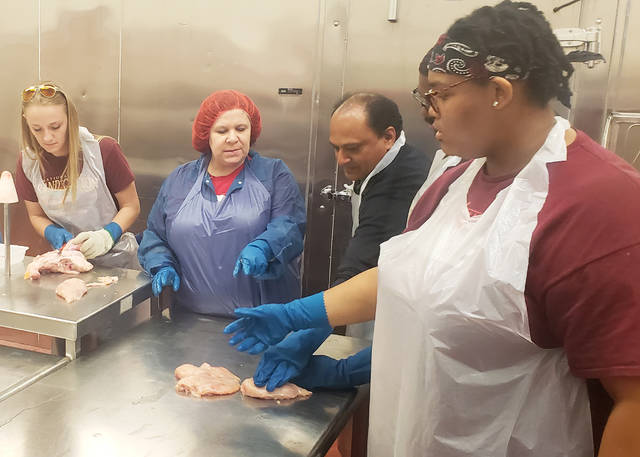 UAPB students learn poultry production techniques at UAF