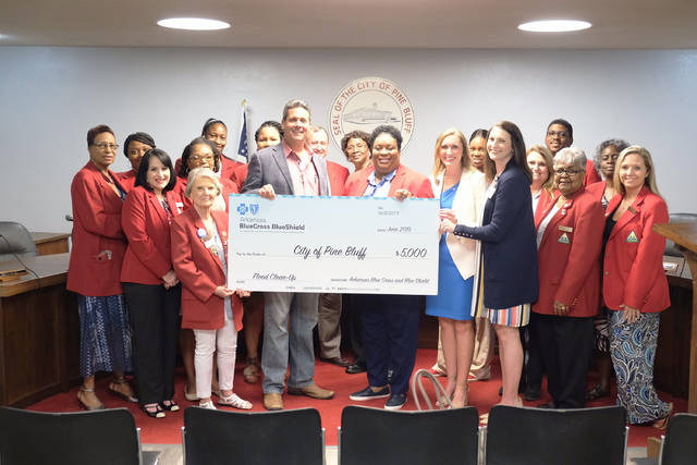 Blue Cross presents $5,000 to Pine Bluff for flood cleanup