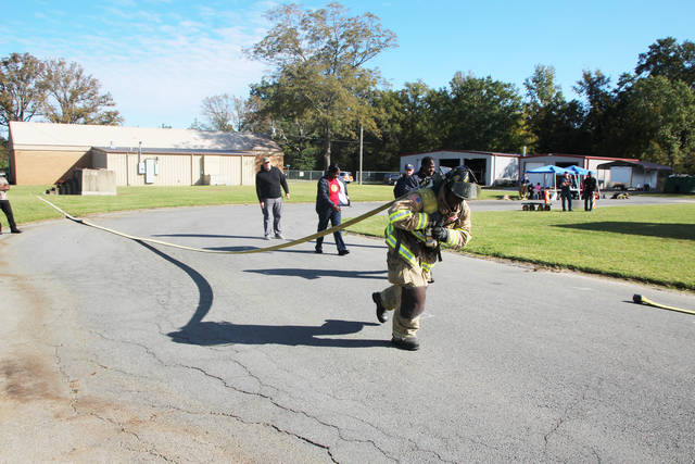 Firefighters work on annual training and fitness evaluation