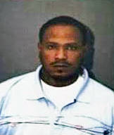 Police seeking murder suspect