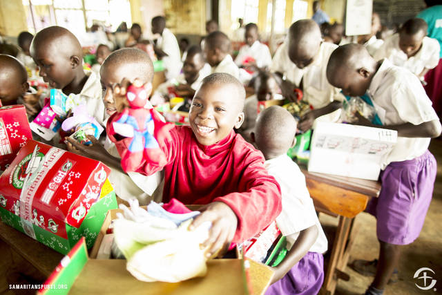 Locals collecting shoebox gifts for children overseas