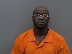Man on probation arrested after gun found