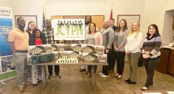Young Professionals provide chess boards to downtown group