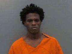 Prosecutor charges Moore with three counts of murder