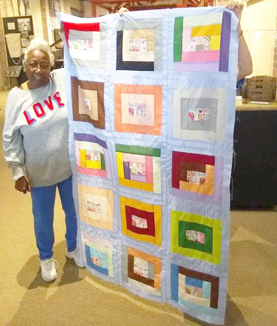 Grand Prairie Quilters display topper, submit essay