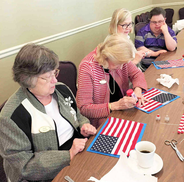 Colonial Dames make Braille flags for students