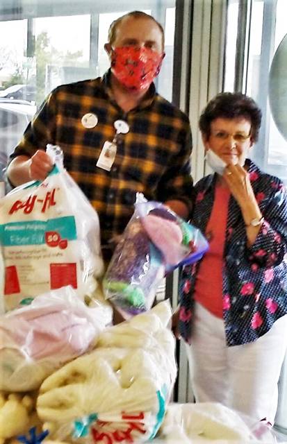 WH Willing Workers make dolls, caps for Children’s Hospital