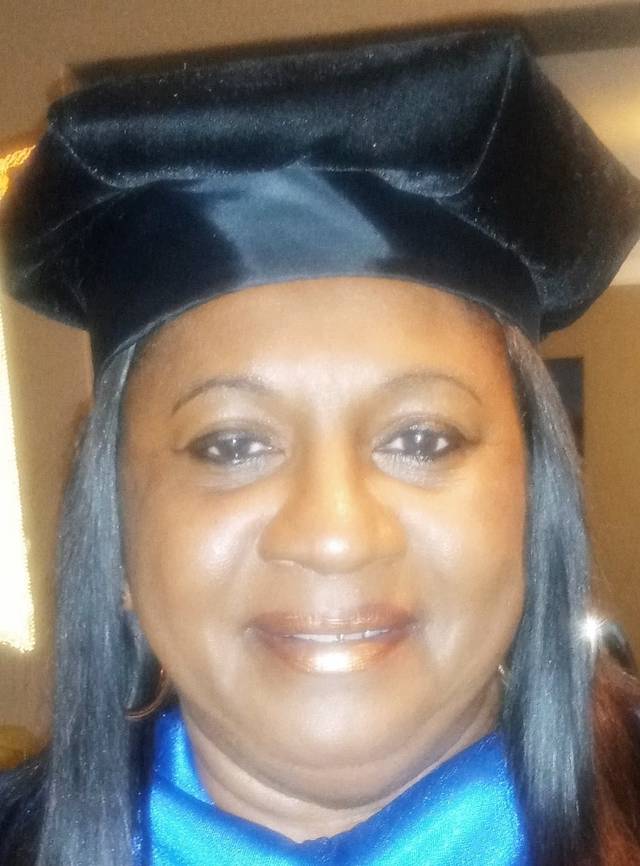 Local minister, educator earns doctorate
