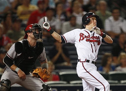 Martin Prado of the Atlanta Braves takes a lead against the