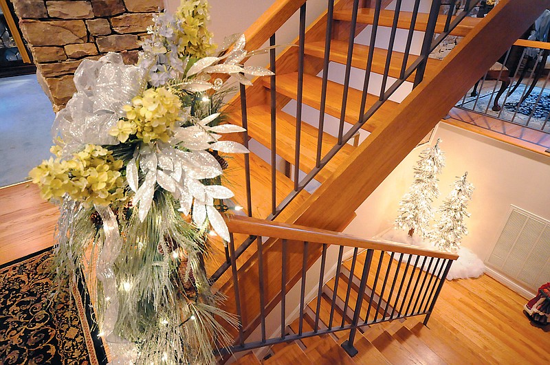 SoddyDaisy home has trees decorated with flowers, feathers and finery