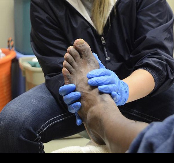 Foot care for homeless UTC students provide service, look for health