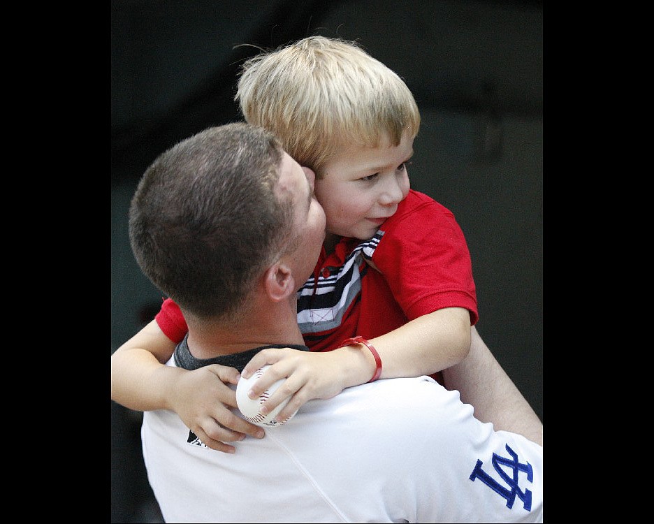 Just home from deployment, Sgt. Brandon Guy surprises his son at a ...
