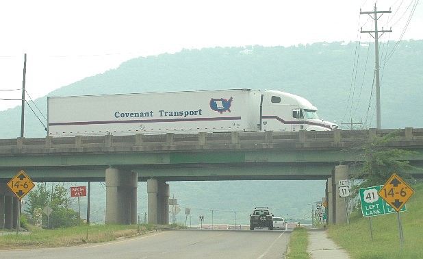 A Covenant Transport truck drives along I-24 over Cummings Highway in this 2008 photo.
