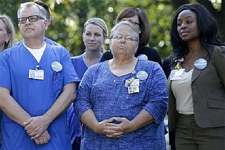 CDC releases revised Ebola gear guidelines | Chattanooga Times Free Press