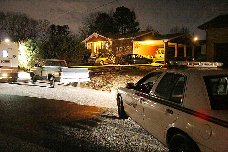 Staff Photo by Patrick Smith<br>
Chattanooga Police sit at the scene of a home invasion where Franklin Bonner, 68, was bound and later died on Enterprise Lane on Friday. Chattanooga Police are continuing to investigate what appears to be a homicide.