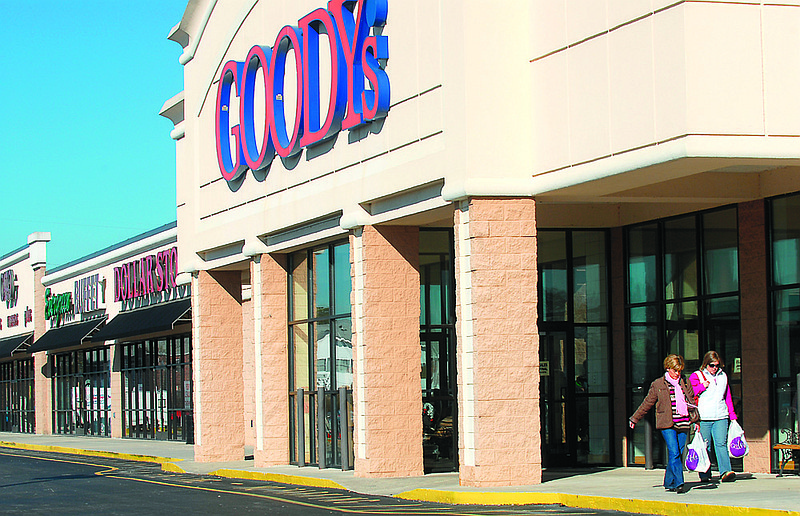 Staff Photo by Gillian Bolsover<br>
Brooks Thompson, left, and Aimee Evans leave Goody's in Fort Oglethorpe Friday after shopping there for sale items. The chain announced that it would liquidate its remaining stores.