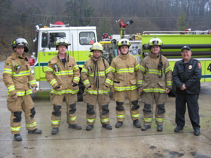 Tri-Community Volunteer Fire Department will spend funds from a FEMA grant on new fire hoses. From left are engineer Matt Randall, firefighters Telly Grant, Derek Garcia, Josh Fraker and Joel Willis and battalion training chief Steve Wright.