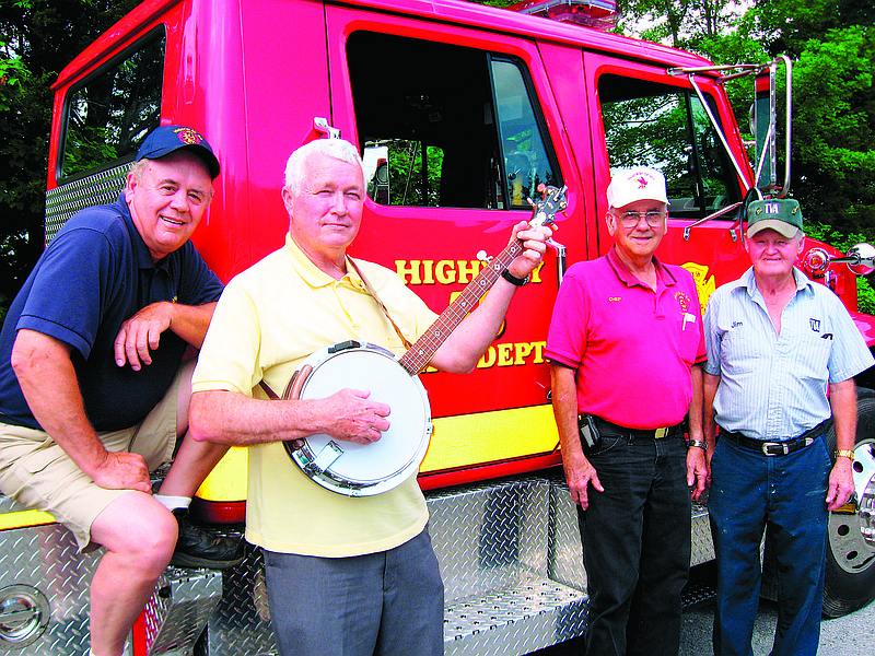 Jerry Wilson, Ronnie Nichols, Fire Chief C.R. Harris and Jim Proffitt, from left, are this year's organizers for the 7th annual Highway 58 Volunteer Fire Department Tractor Show and Bluegrass Jamboree being held June 6.