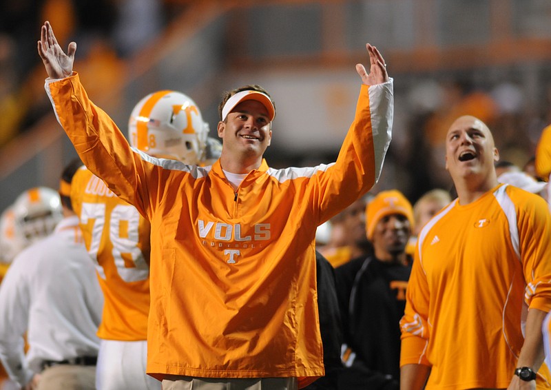 Staff Photo by Angela Lewis
UT coach Lane Kiffin reacts while watching the replay on the Jumbotron of Wes Brown's interception and touchdown in the last 30 seconds of the game at Neyland Stadium Saturday. UT won 31-16.