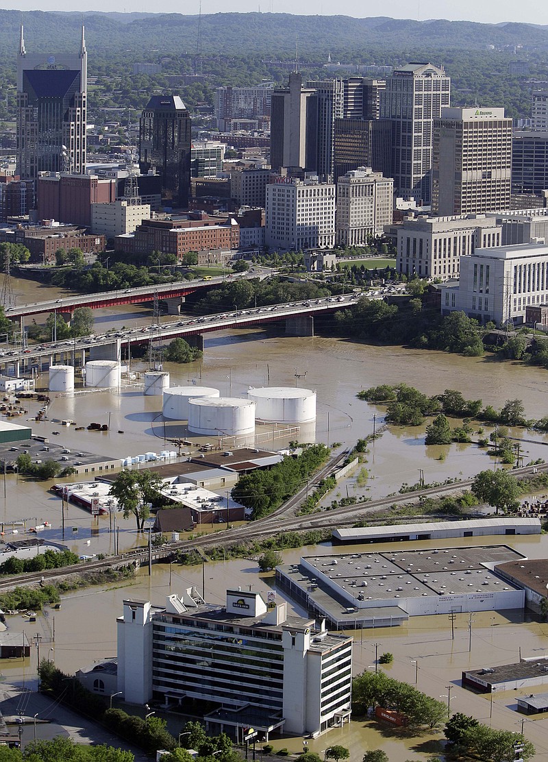 Water from Cumberland River flows over its banks in Nashville, Tenn., on Monday, May 3, 2010. After heavy weekend rains and flooding, officials in Tennessee are preparing for the Cumberland River, which winds through Nashville, to crest more than 11 feet Monday afternoon.  (AP Photo/Mark Humphrey)