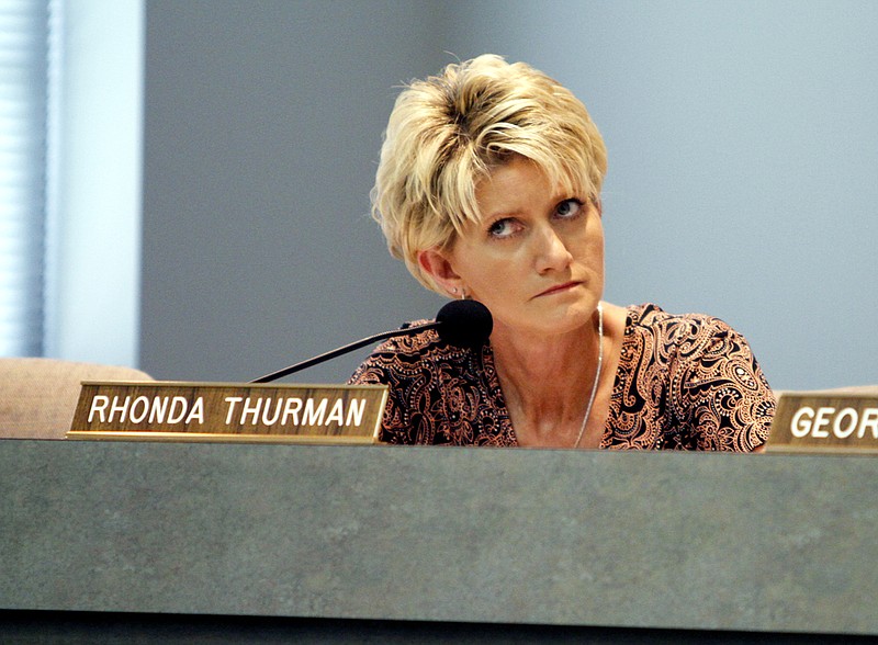 Board of Education member Rhonda Thurman listens to discussion during a special BOE meeting.