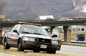 Staff Photo by Dan Henry/Chattanooga Times Free Press
Georgia State Patrol Trooper Stephen Kennedy operates a laser speed detector monitoring motorists as they pass the Ringgold, Ga., exit as he patrols Catoosa and Whitfield counties.