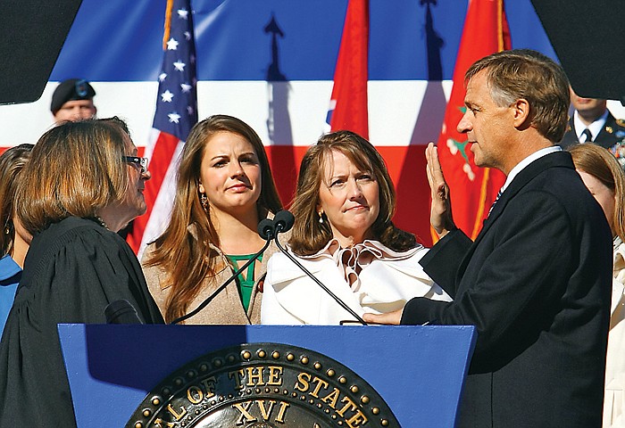 The Associated Press
Tennessee Supreme Court Chief Justice Cornelia A. Clark, left, administers the oath of office to Gov. Bill Haslam shortly before noon Saturday in Nashville.