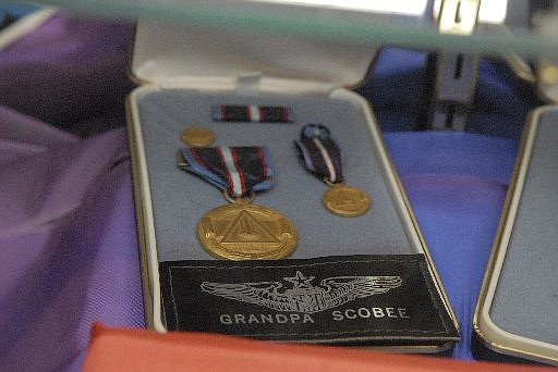 Some of shuttle commander Dick Scobee's medals are on display at the Challenger Center on the UTC campus in 2011.