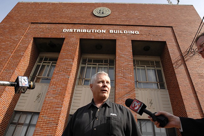 File photo: EPB President and CEO David Wade talks to the media outside the EPB Distribution Center in Chattanooga in 2011. 