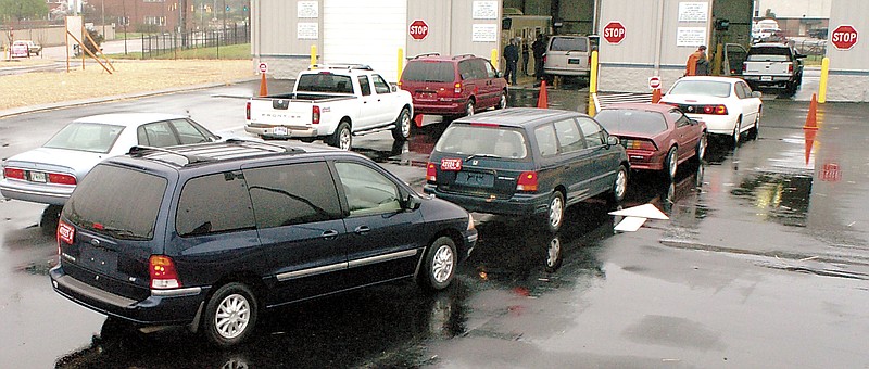 Cars line up for auto emissions testing at the Riverfront Parkway facility. For many with newer vehicles, emissions data can be collected from the vehicle's onboard computer system. Staff File Photo.