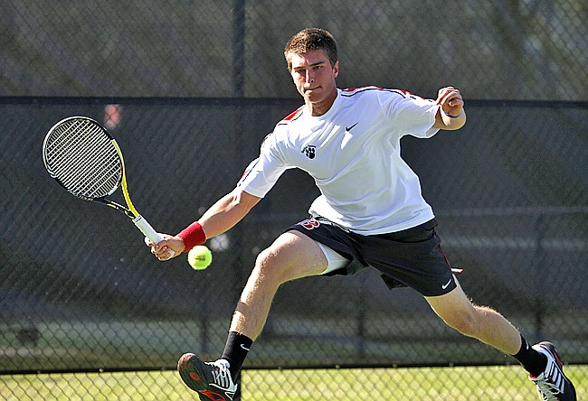 Baylor's Nathan Schley stretches for the ball in his match against Montgomery Bell Academy's Russell Anderson during the Rotary tournament Saturday.
Staff photo by Jake Daniels/Chattanooga Times Free Press