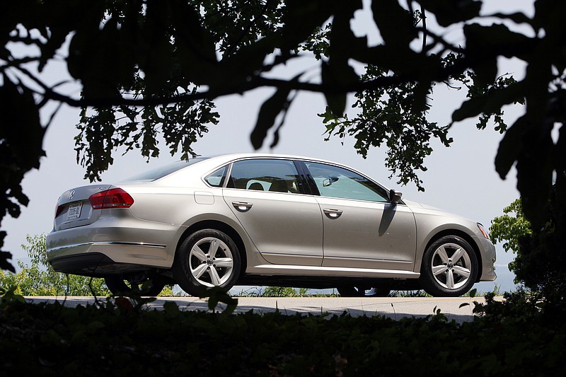 The all-new Chattanooga built VW Passat TDI cruises on East Brow Road atop Signal Mountain early Wednesday afternoon. 
Staff photo by Dan Henry/Chattanooga Times Free Press