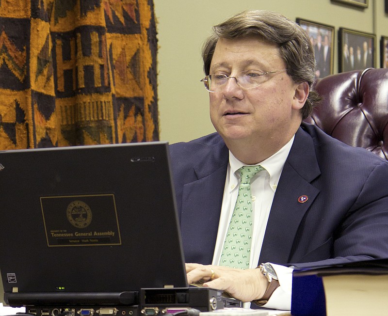 Senate Majority Leader Mark Norris works in his legislative office in Nashville.