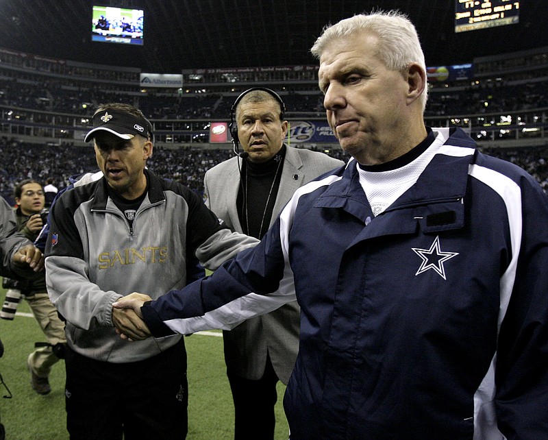 In this Dec. 10, 2006 file photo, then Dallas Cowboys coach Bill Parcells, right, shakes hands with New Orleans Saints coach Sean Payton after the Saints defeated the Cowboys 42-17 in an NFL football game in Irving, Texas. (AP Photo/Matt Slocum, file)