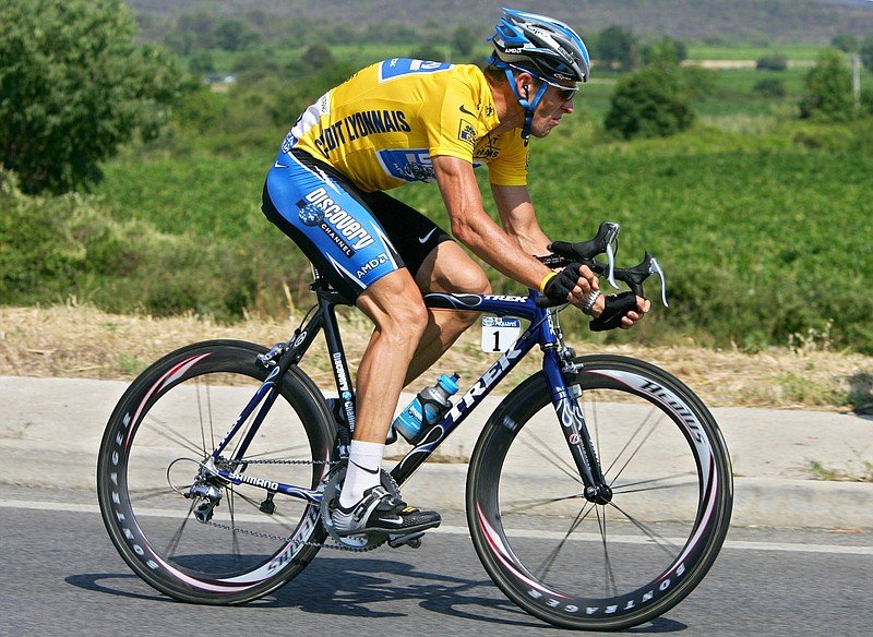 FILE- In this July 15, 2005, file photo, overall leader Lance Armstrong, of Austin, Texas, pedals during the 13th stage of the Tour de France cycling race between Miramas and Montpellier, southern France. A Trek Bicycle Corp. spokesman says the company is cooperating with federal authorities investigating cyclists including seven-time Tour de France winner Lance Armstrong. (AP Photo/Alessandro Trovati, File)