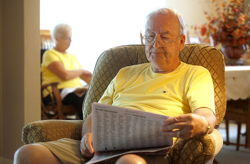 Matt Nevels reads the newspaper with his wife Frances at their Red Bank home Sunday, June 3, 2012. Since leaving Red Bank Baptist Church, many of the Nevels' Sunday mornings have consisted of reading the paper, private devotionals, and watching services on television.
