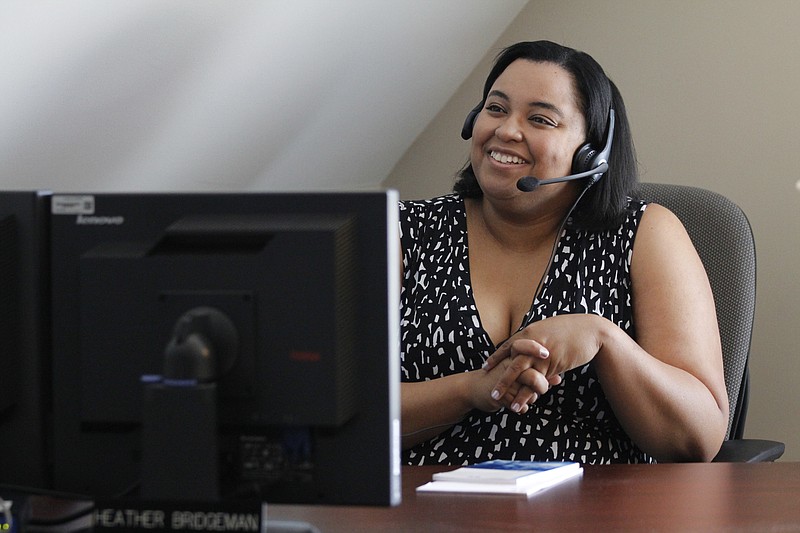 Heather Bridgeman works in her office at her home in Hixson, Tenn. Bridgeman has been working at Blue Cross Blue Shield for five years, and for the past two-and-a-half years she has been telecommuting from home.