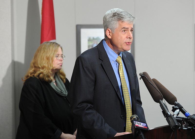 Dr. David Reagan, chief medical officer for the Tennessee Department of Health, right, and Dr. Dr. Marion Kainer, also with the state health department tell local and national media about an outbreak of fungal meningitis infections that have already killed two and sickened 13 others in Nashville.