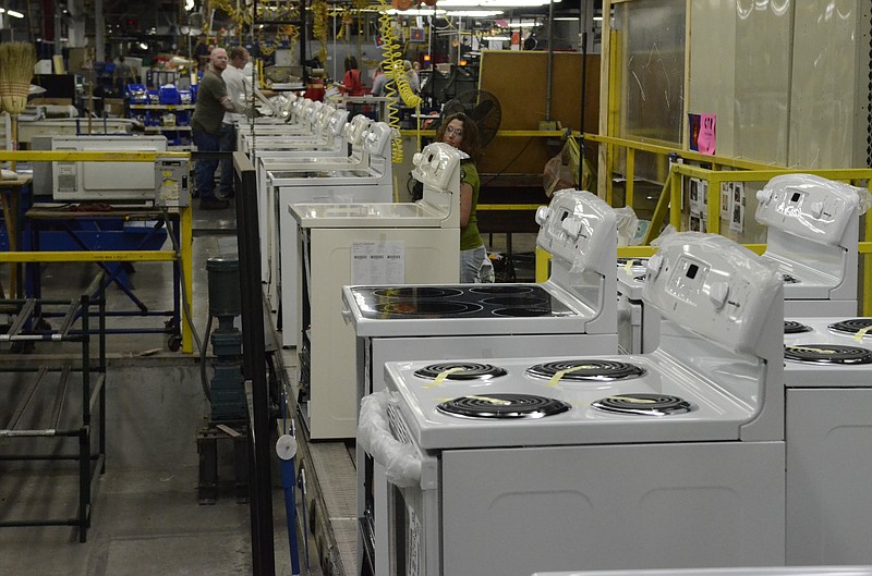 Stoves move through an assembly line at Roper Corp.'s plant in LaFayette.