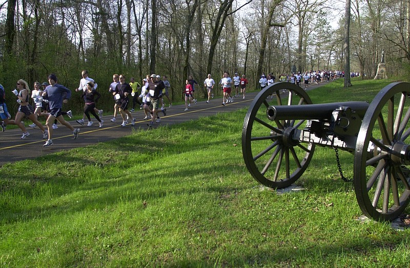 Runners begin a Chickamauga Chase 15K run at the Chickamauga Battlefield.