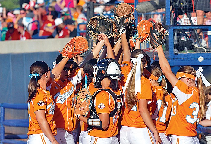 The Lady Vols gather before taking the field Monday against Oklahoma in the first game of the Women's College World Series.