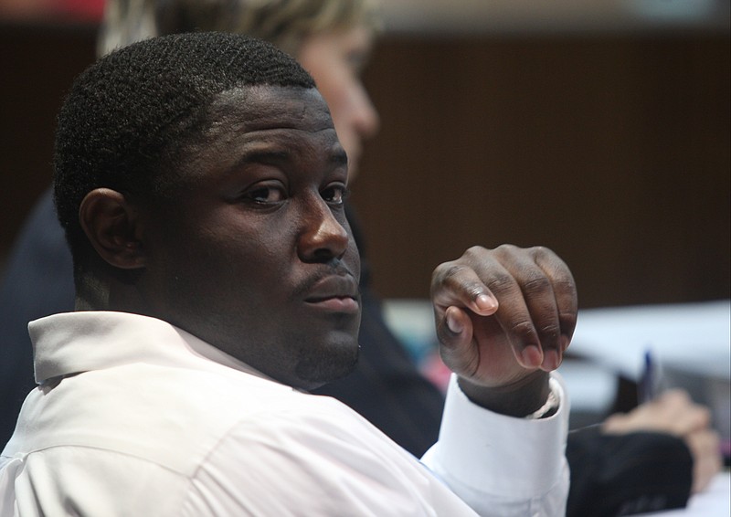 Unjolee Tremone Moore, who is charged with the killing of Bernard Hughes, sits in the Chattanooga-Hamilton County Courts Building in Judge Don Poole's courtroom on Tuesday.