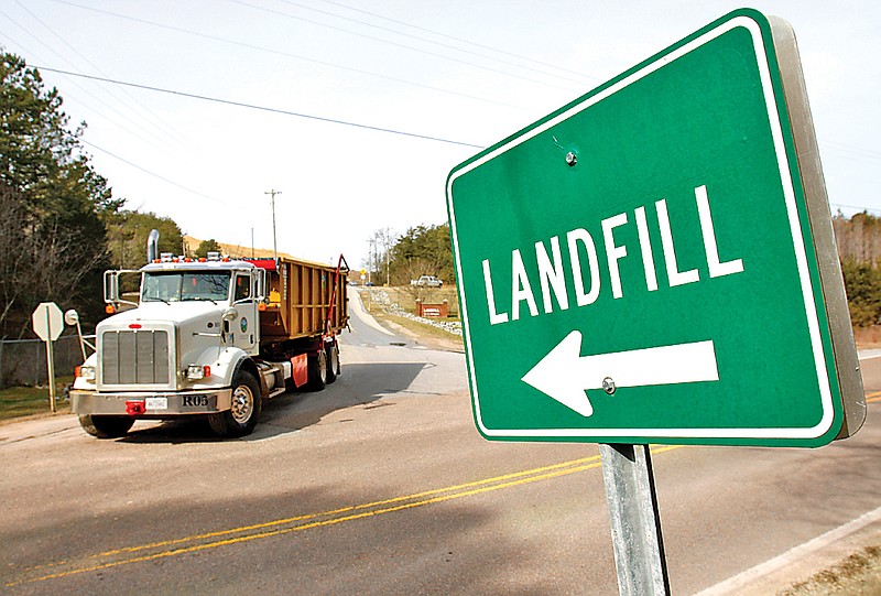 A Chattanooga dump truck leaves Chattanooga and C&D landfill complex in Harrison, TN.
